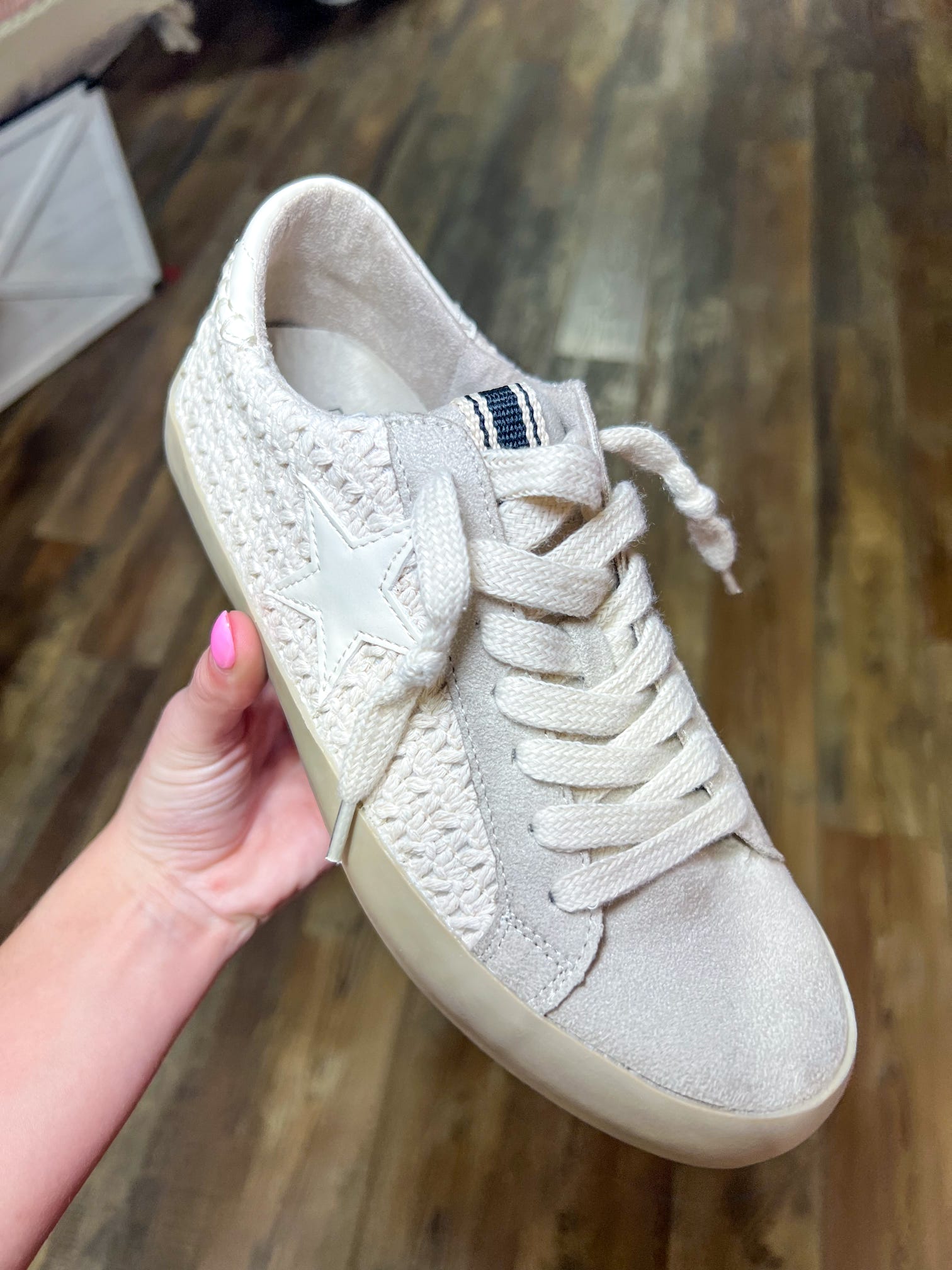 Another photo of our beige ‘distressed’ sneaker made of crochet material and a beige star.