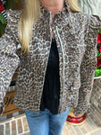 Up close photo of the leopard print denim jacket with ruffle details