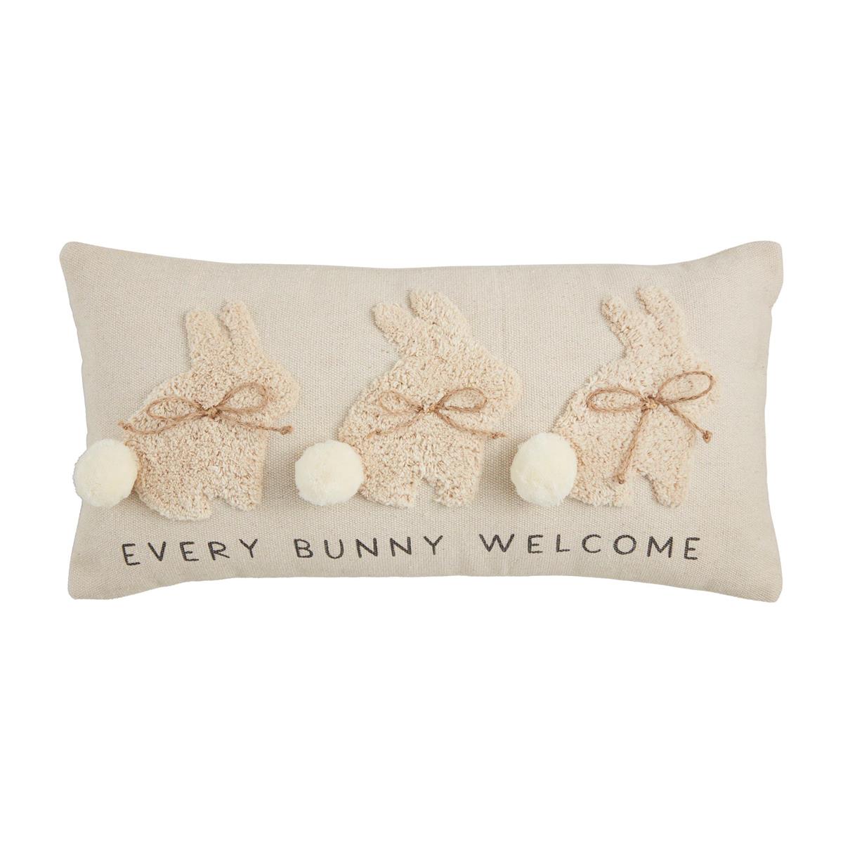Photo of our linen colored cotton pillow with saying "Every Bunny Welcome" and has tufted applique bunnies. Zipper closure.
