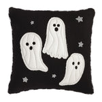 Black pillow with white ghost designs and star patterns on a white background
