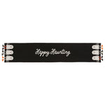 A black Halloween-themed runner or banner with 'Happy Haunting' written in white script across the center, decorated with cartoon ghosts and orange pumpkins on both ends.