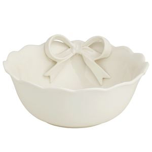 White ceramic bowl with a decorative bow on a white background