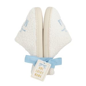 Pair of white slippers with blue accents saying Mama on a white background