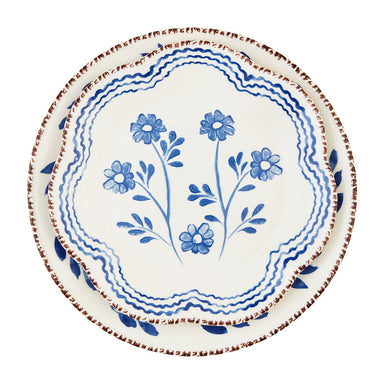 Photo of nested set of two blue floral stoneware platters with hand-painted rims