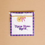 Gold bead bracelet with Sigma Sigma Sigma charm and a lavender bow charm