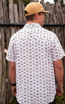 Man modeling the back of our short sleeve button up shirt with an all over print of Mallard ducks 