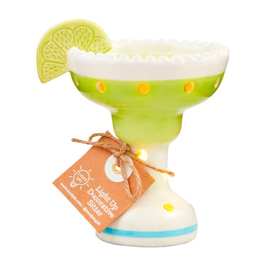 Photo of our ceramic light up sitter in a margarita glass complete with a lime design. Comes with batteries 