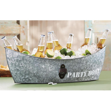 Photo of our generously sized galvanized tub not only keeps your beverages chilled, but also features a handy metal bottle opener on the exterior and saying PARTY BOAT next to the opener. Photo shows tub holding beverages, ice and limes as an example.