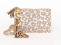 Dangling heart keychain with attached coin purse in a fun, shimmery leopard and pink print