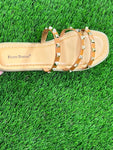 brown strappy flat sandal with gold beads on the straps